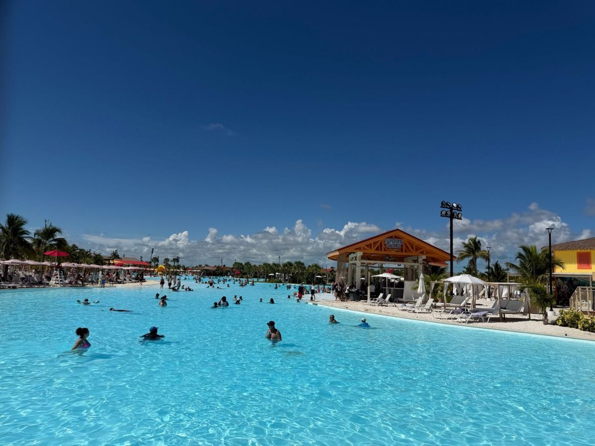 Calypso Lagoon with Sunshine Swings Bar and loungers along the paved lagoon edge